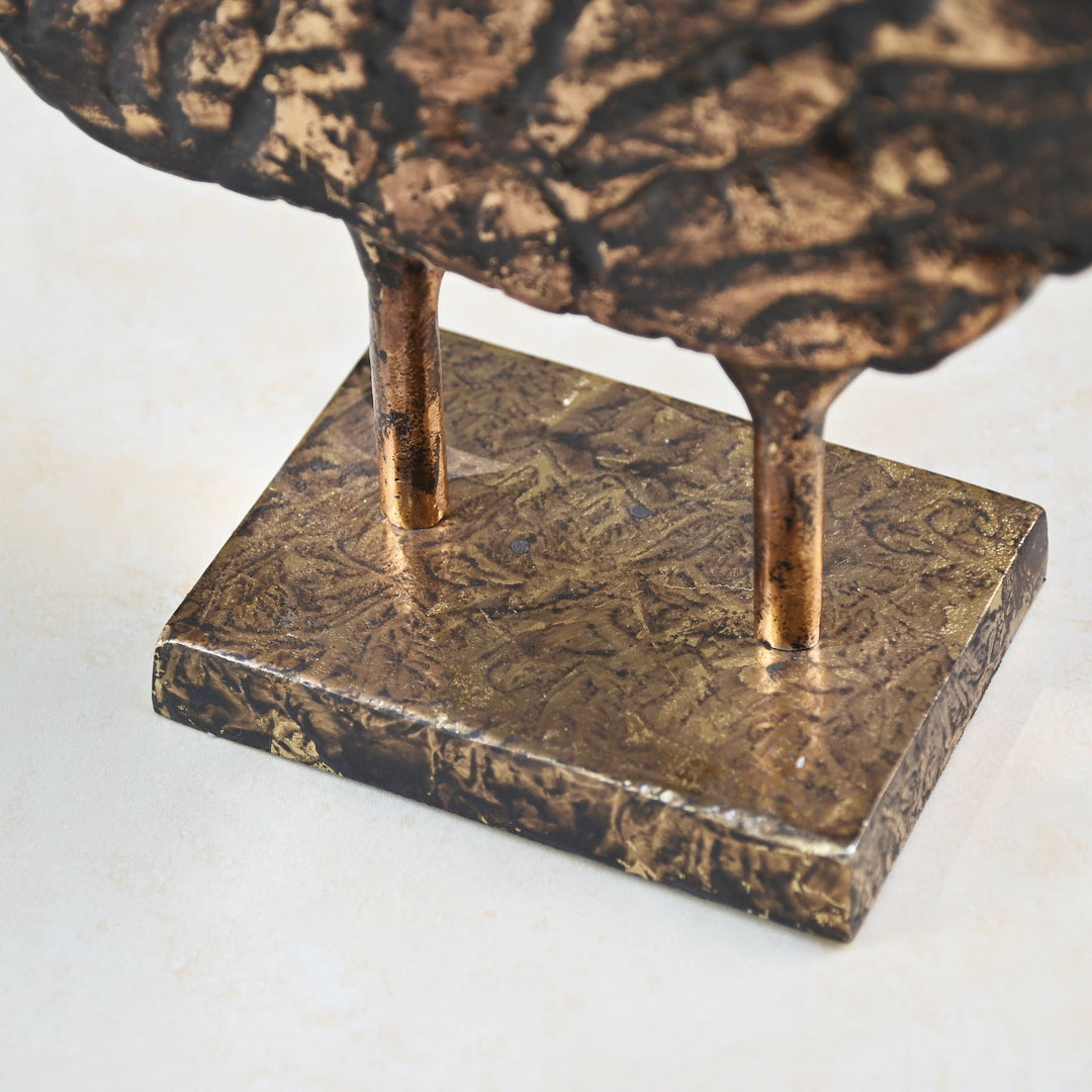 Bark-inspired antique gold tabletop décor