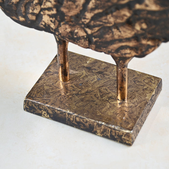 Bark-inspired antique gold tabletop décor