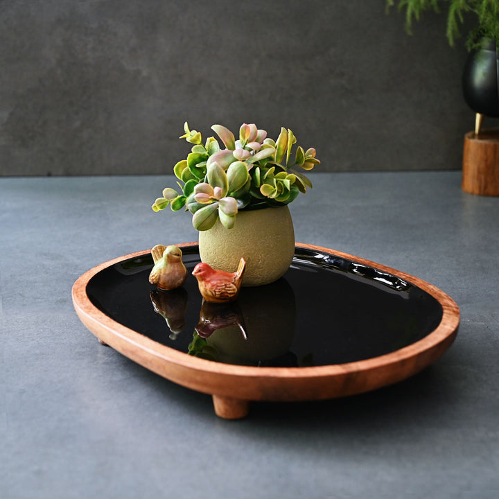 black display tray with wooden legs