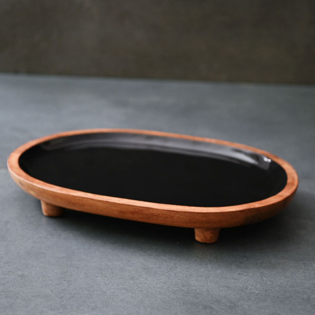 black display tray with wooden legs