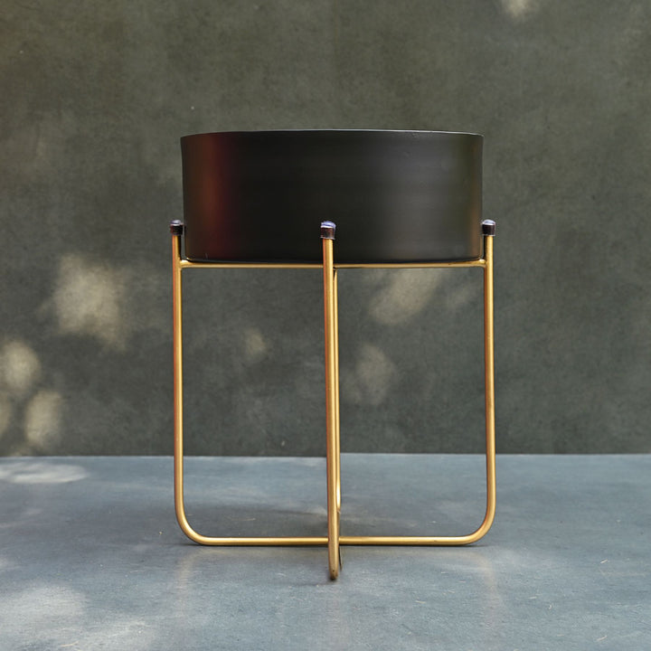 black metal planters with gold stand