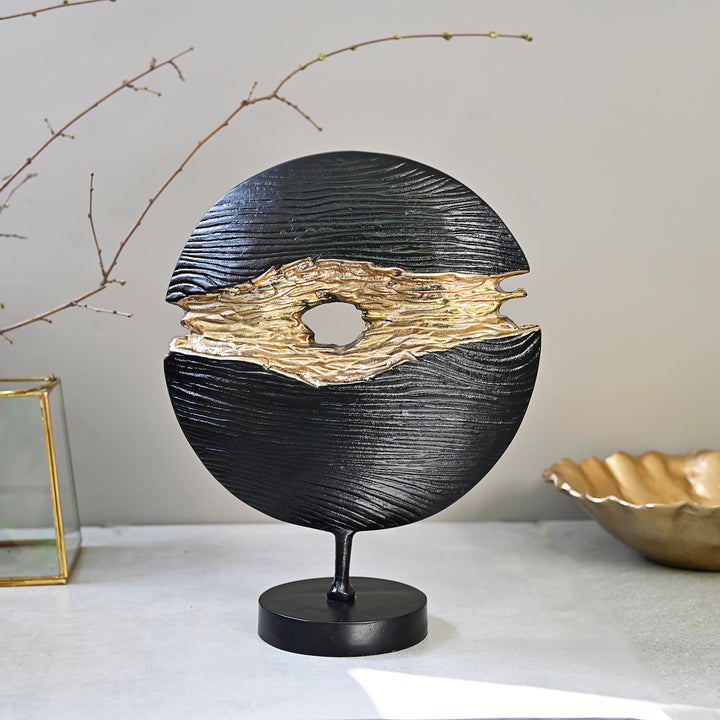 black and gold round tabletop accent