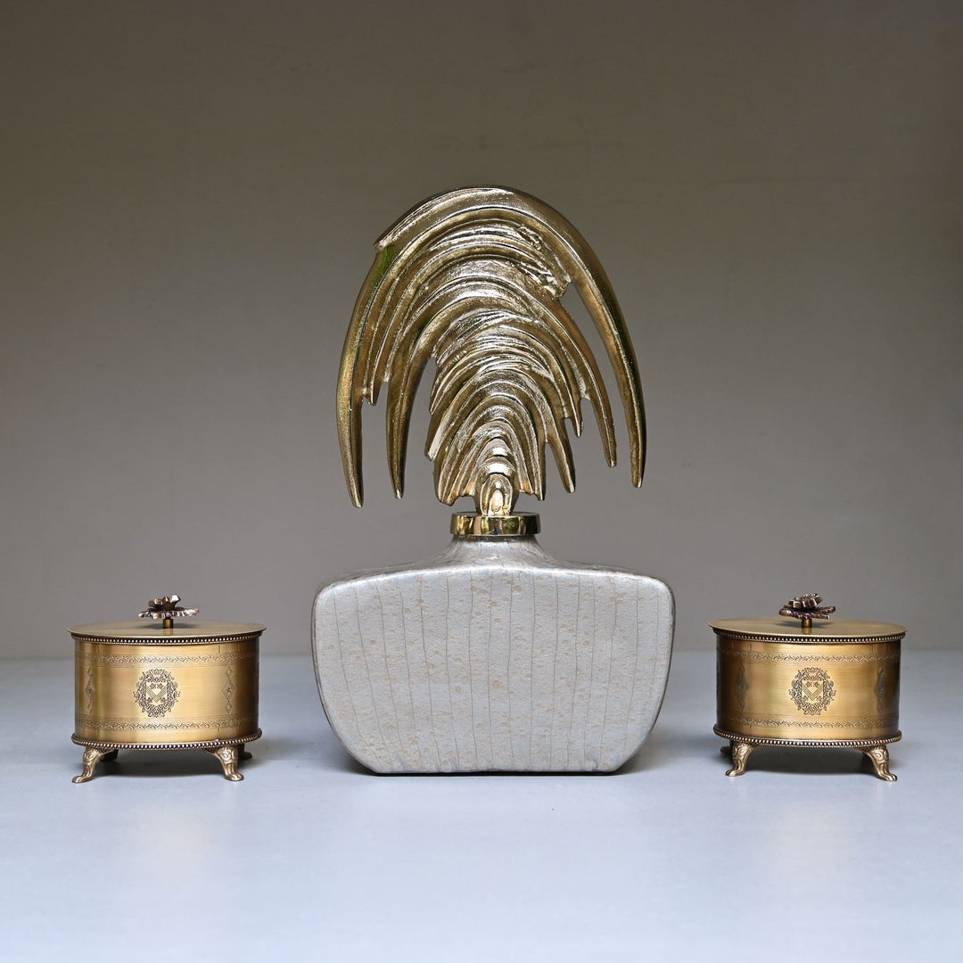 silver decorative bottle with decorative  gold stopper
