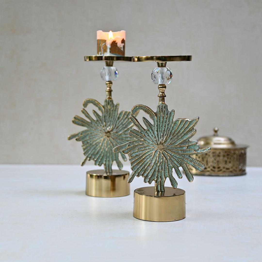 green floral candlestand pair