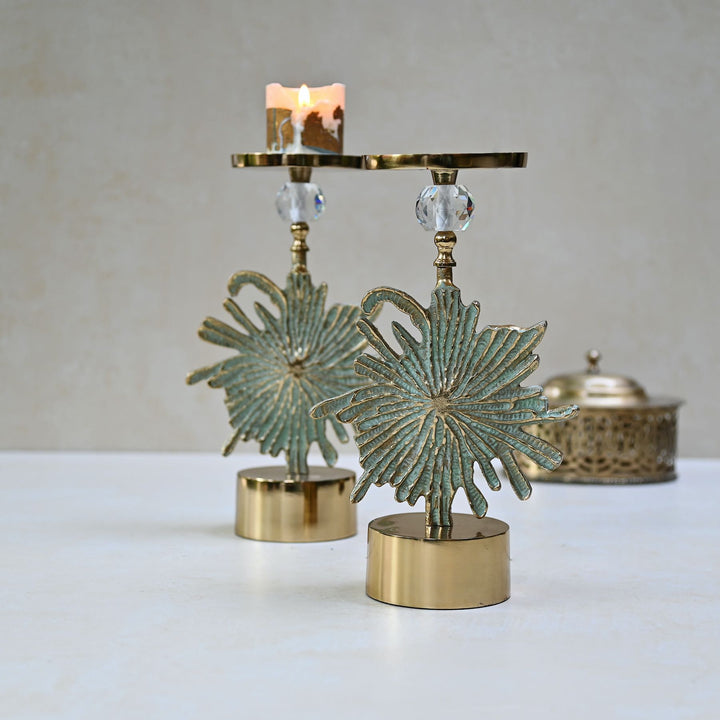 green floral candlestand pair