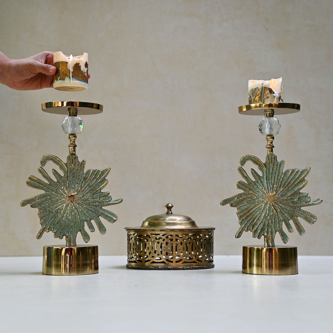 green floral candlestand pair