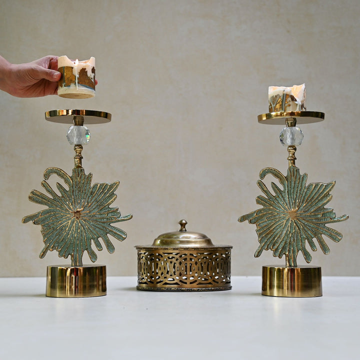 green floral candlestand pair