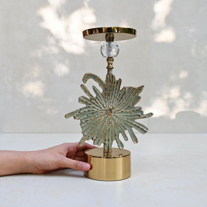 green floral candlestand pair