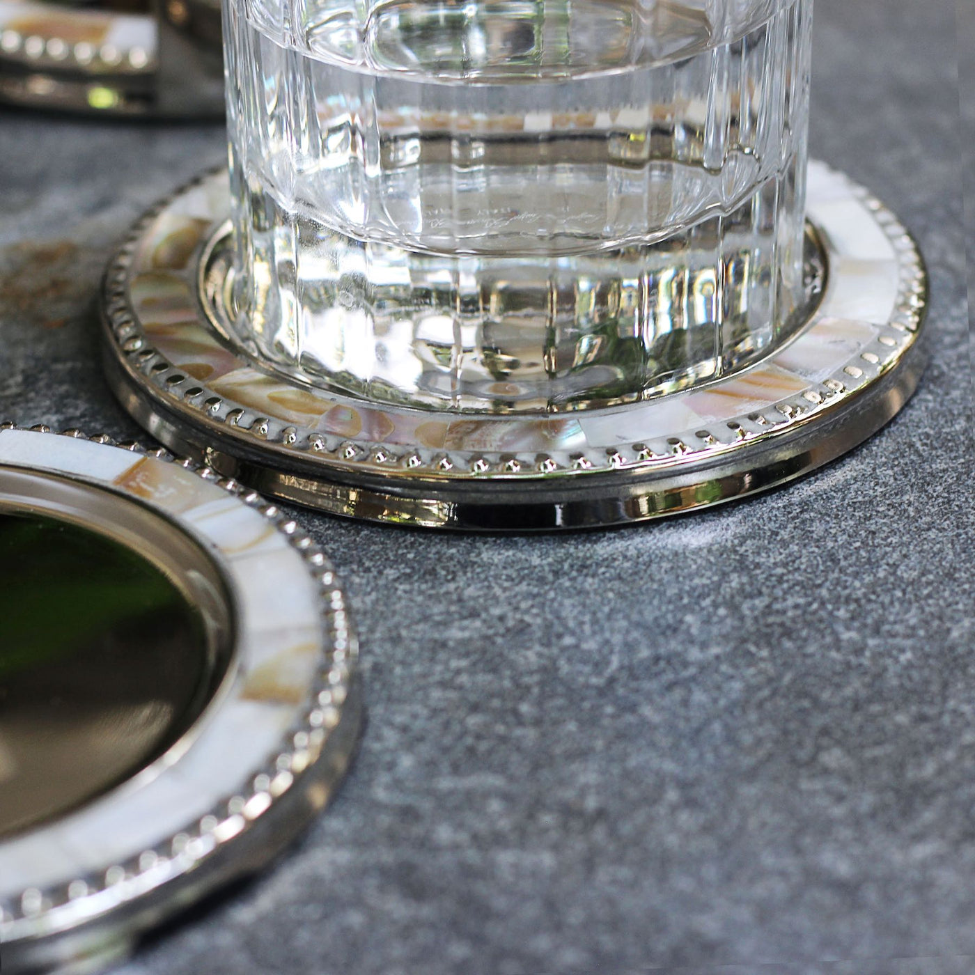 round brass and mother of pearl coasters set