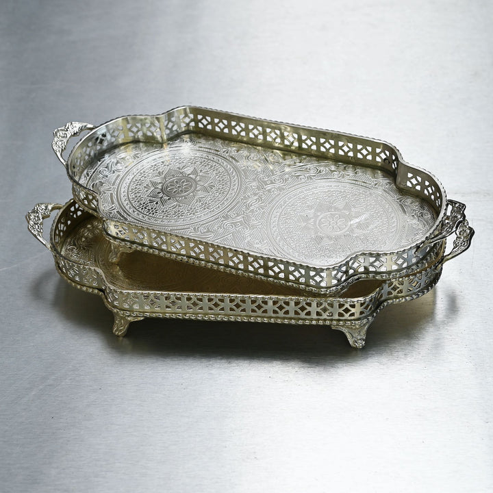 Decorative silver brass tray with intricate etching and side handles