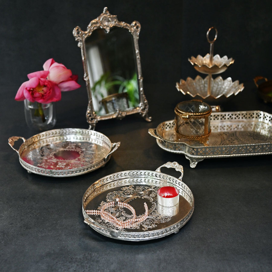 Antique silver round brass trays with etched detailing and side handles