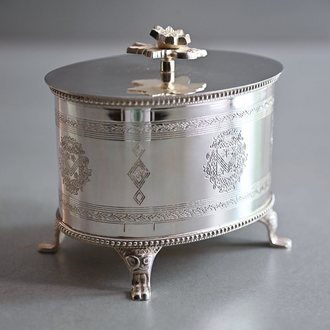round silver box with lid