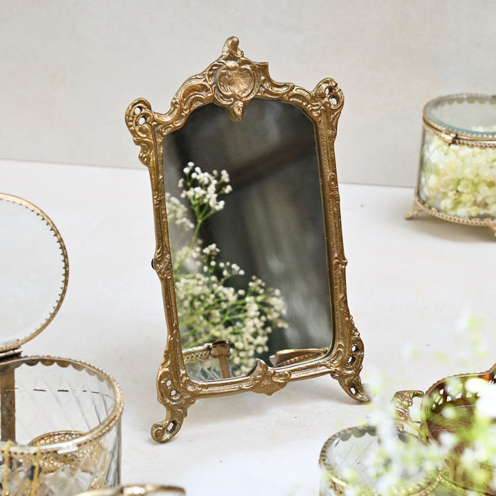 small golden tabletop vanity mirror