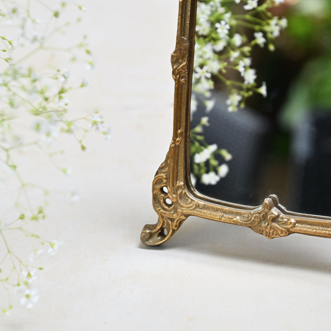 small golden tabletop vanity mirror