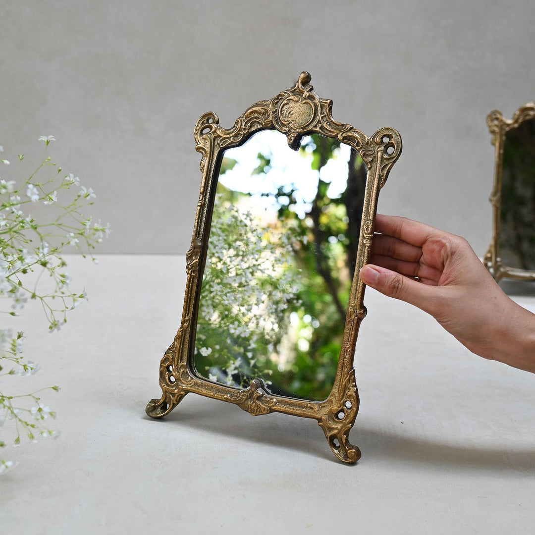 small golden tabletop vanity mirror