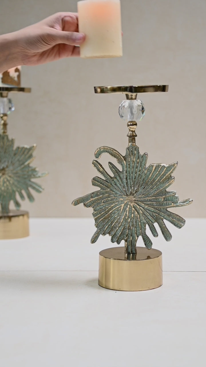 green floral candlestand pair