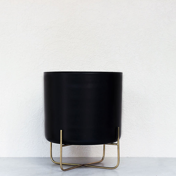 black tub metal planter with stand