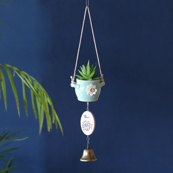 windchime with miniature pots and bells