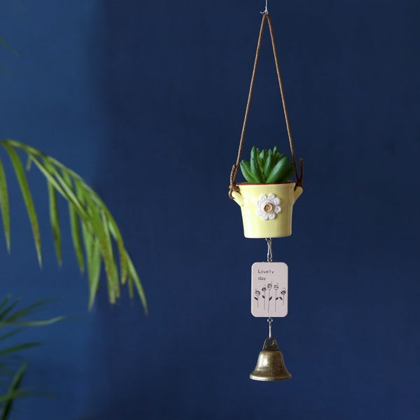 windchime with miniature pots and bells