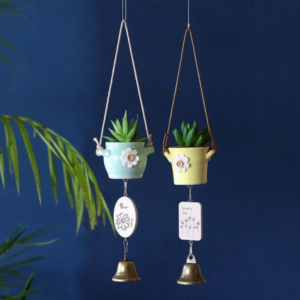 windchime with miniature pots and bells