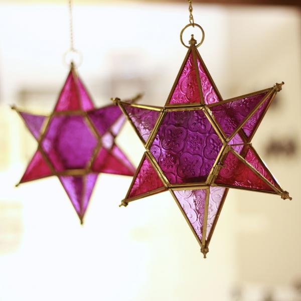 star shaped brass and glass pink t light holders