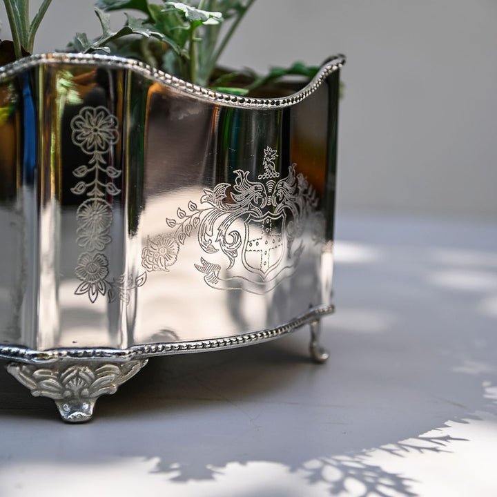 brass and steel indoor planter
