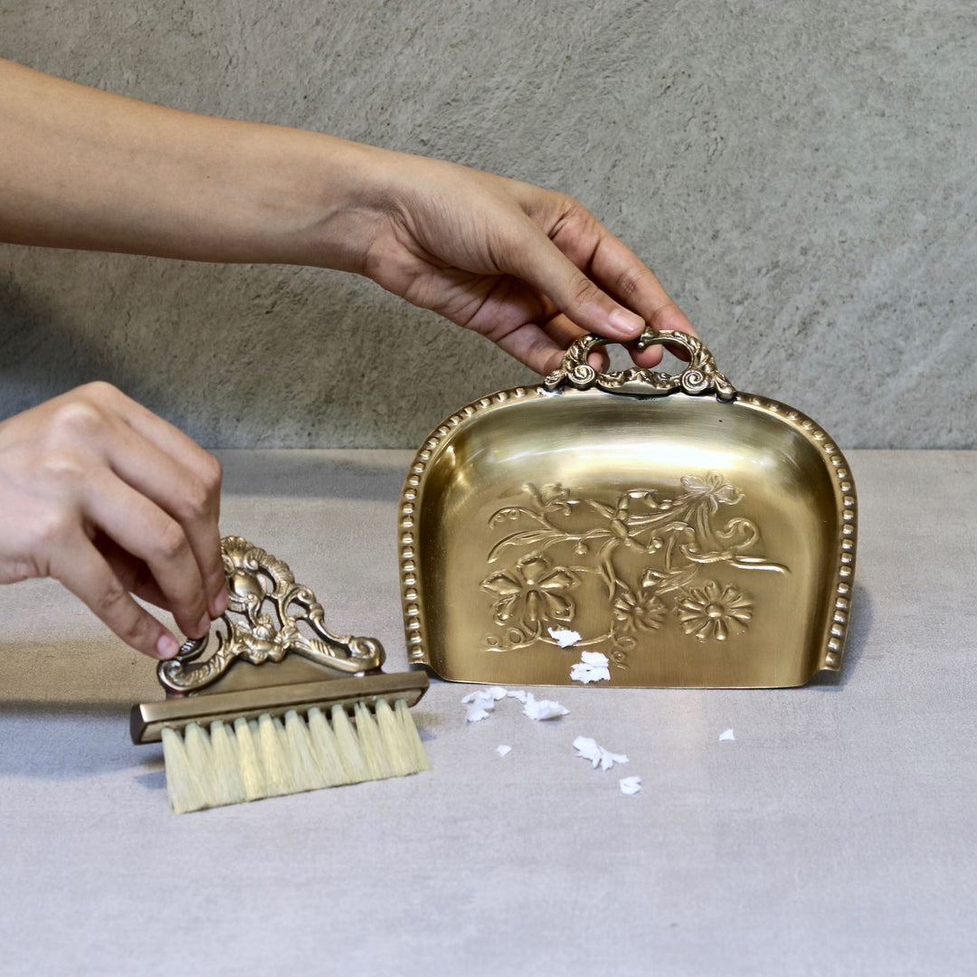 brass dust pan and brush