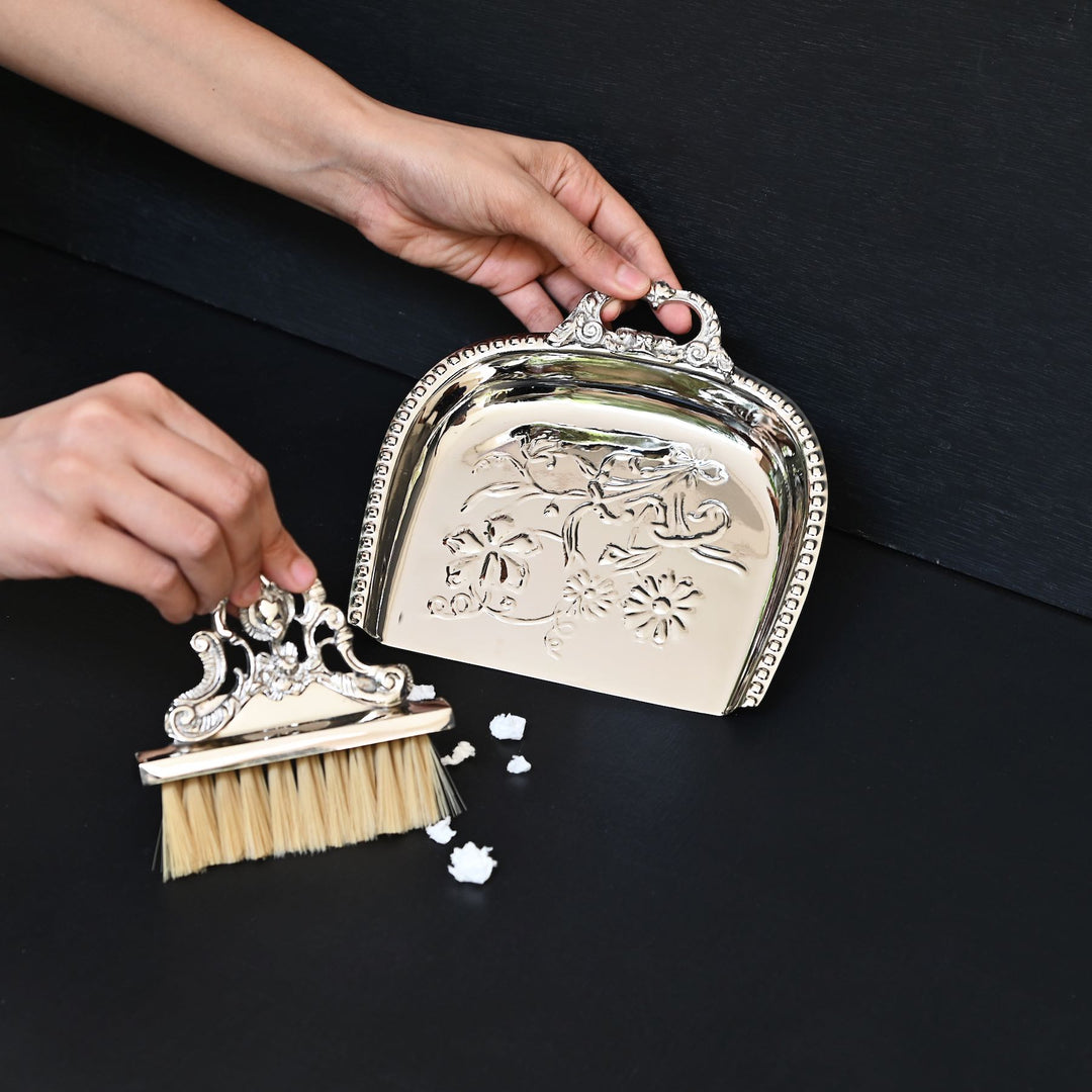 brass dust pan and brush