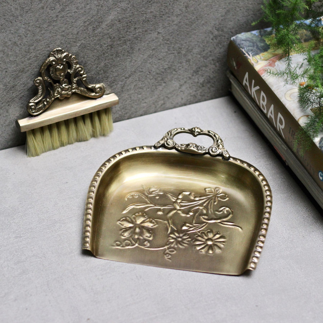 brass dust pan and brush