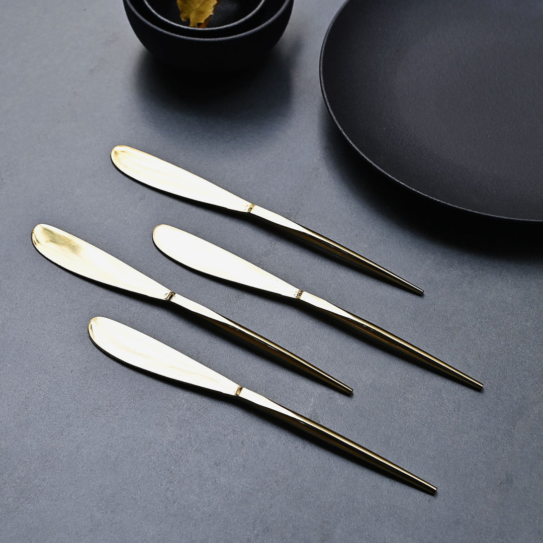 sleek gold table knife