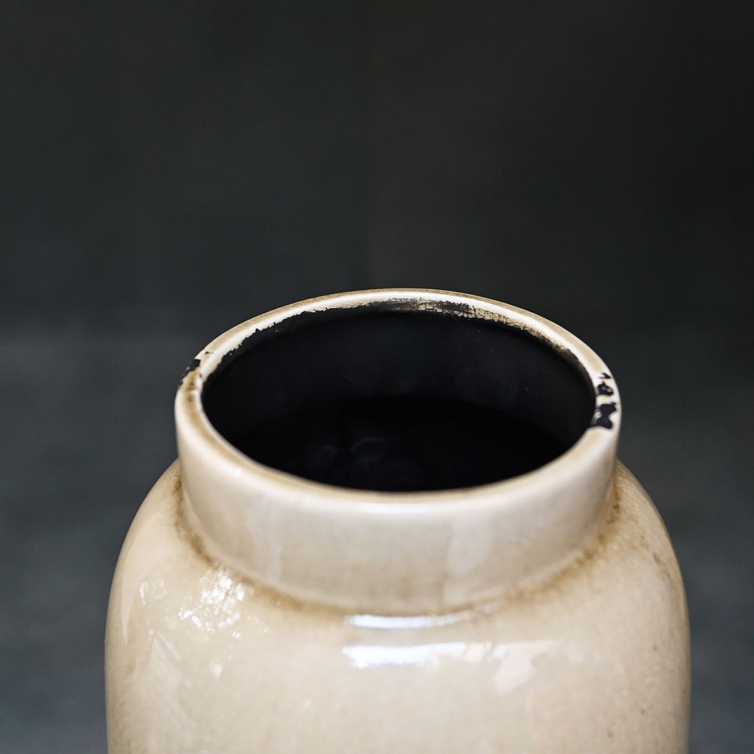 beige ceramic vase