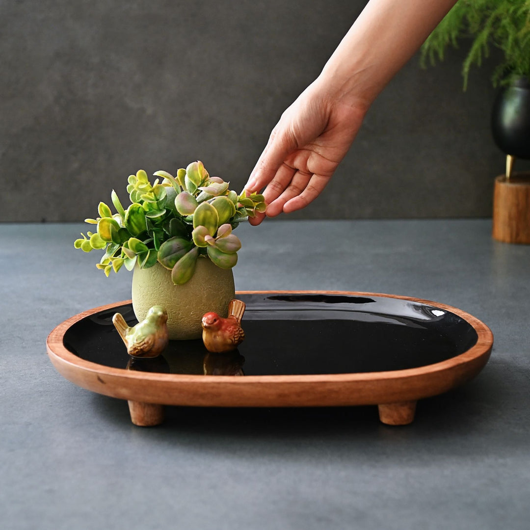 black display tray with wooden legs