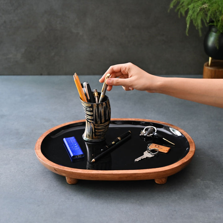 black display tray with wooden legs