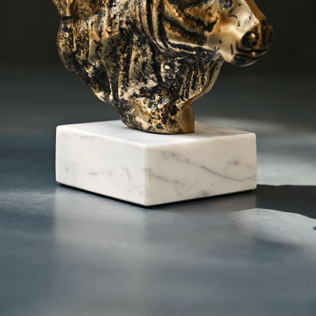 Antique brass bull head sculpture with marble base