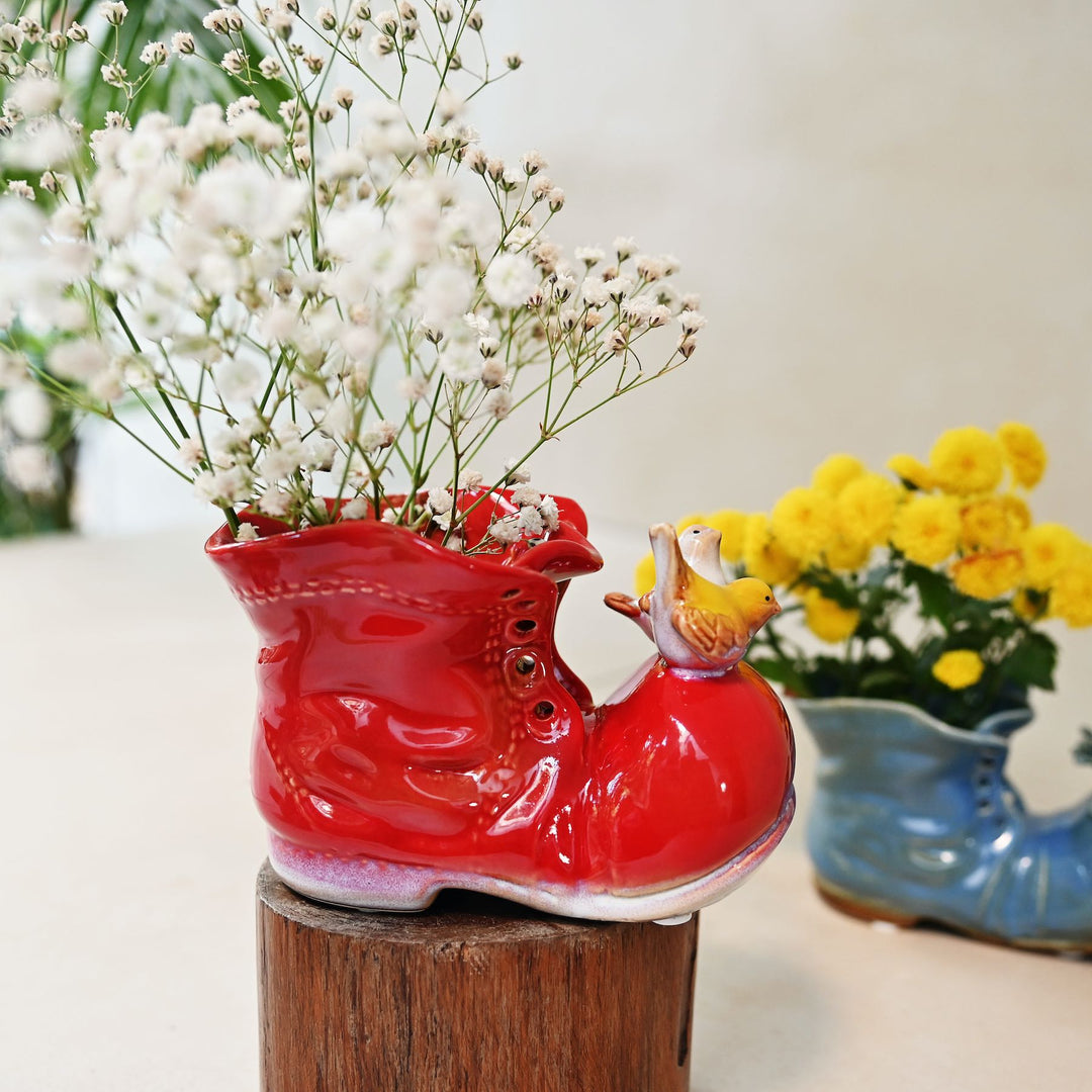 red ceramic shoe showpiece