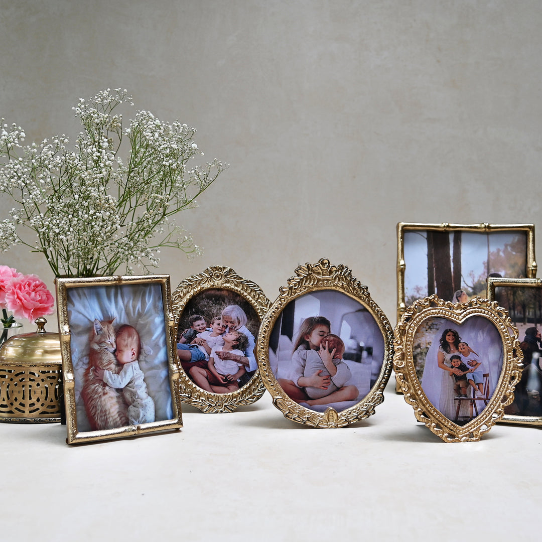 small golden photo frames