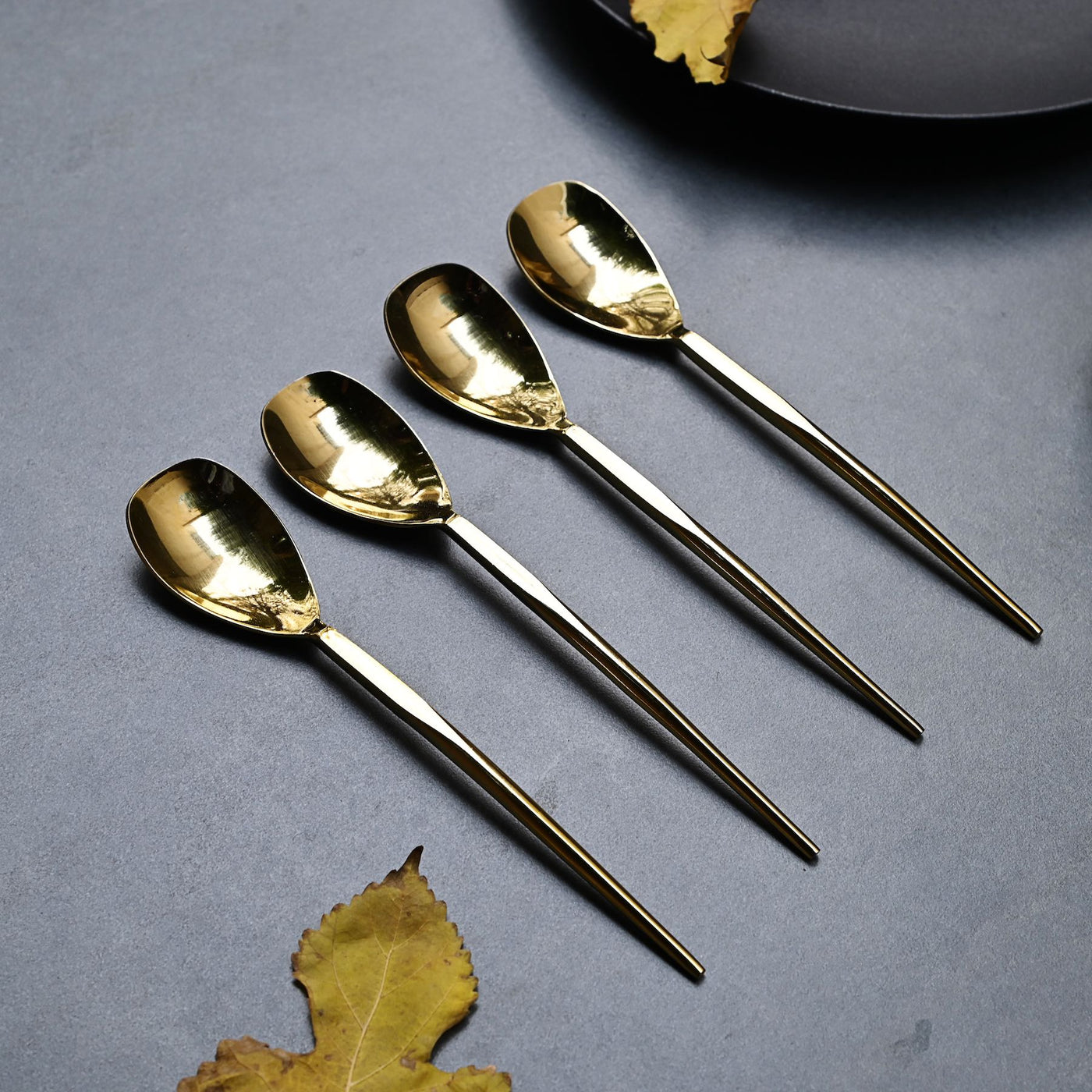 sleek gold table spoons