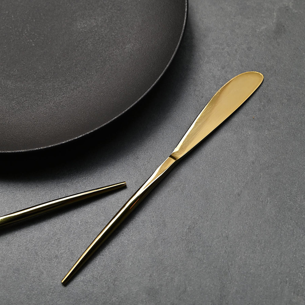 sleek gold table knife