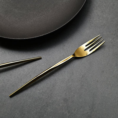 sleek gold table fork