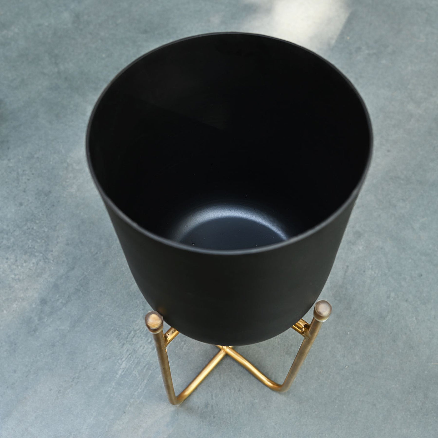 black metal planters with gold stand