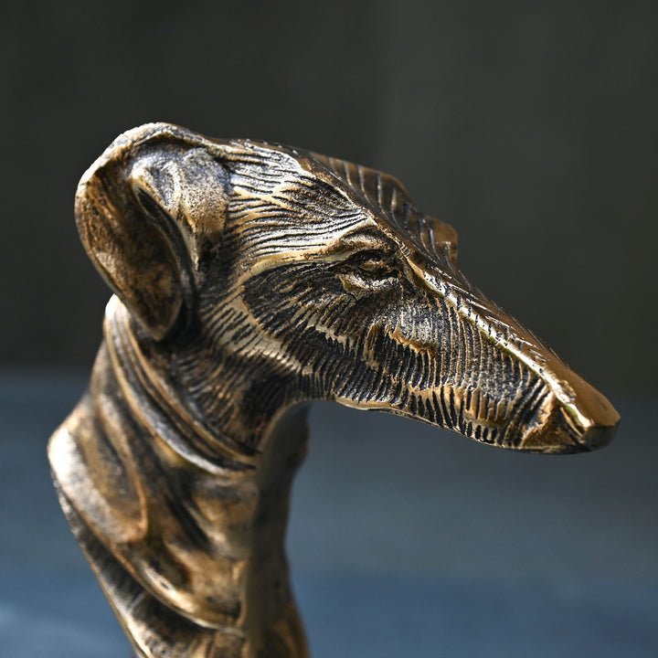 Antique brass greyhound sculpture on marble base