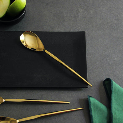 sleek gold table spoon