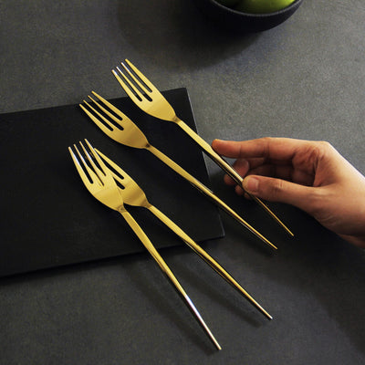 sleek gold table forks