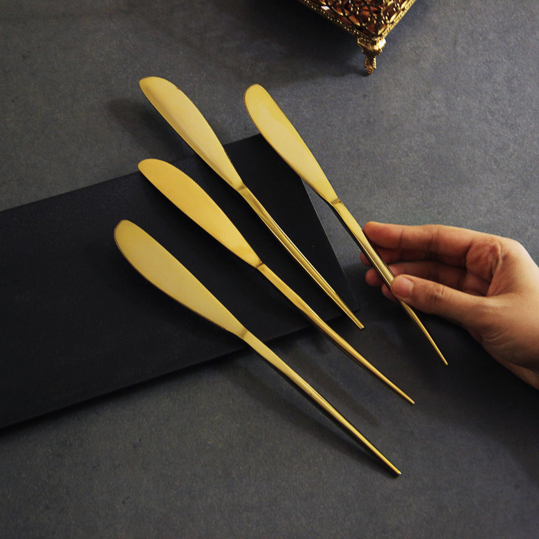 sleek gold table knife