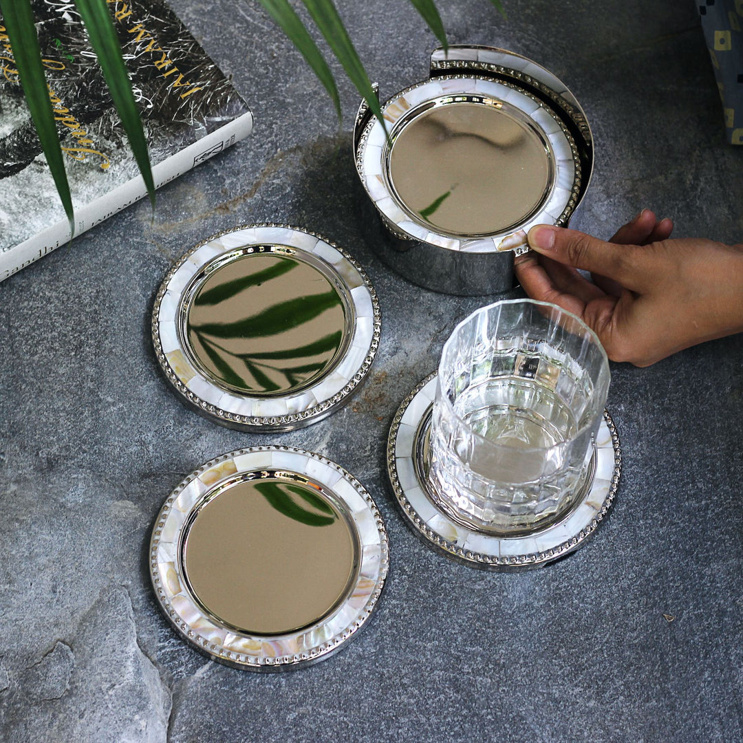 round brass and mother of pearl coasters set