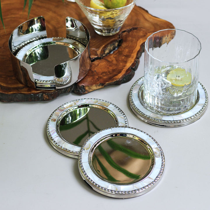 round brass and mother of pearl coasters set