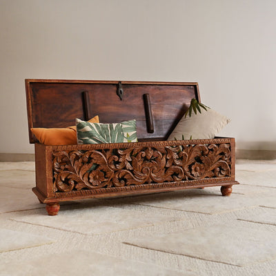 wooden chest for storage with hand carvings