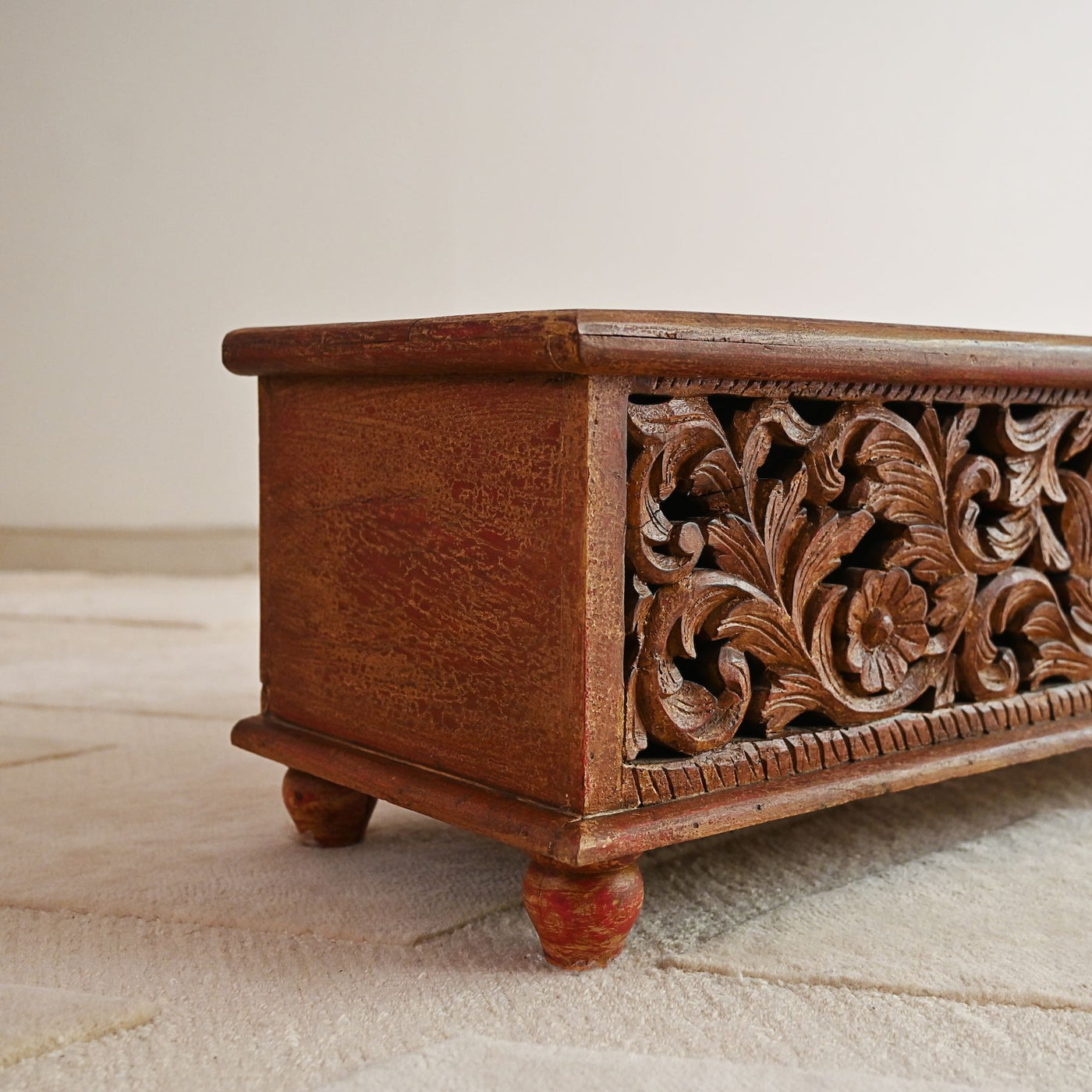 wooden chest for storage with hand carvings