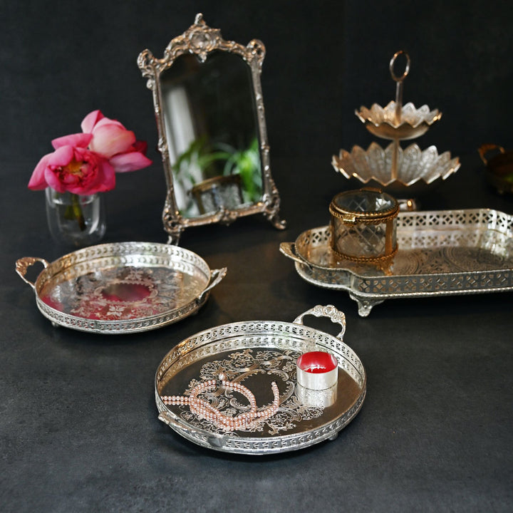 Antique silver round brass trays with etched detailing and side handles