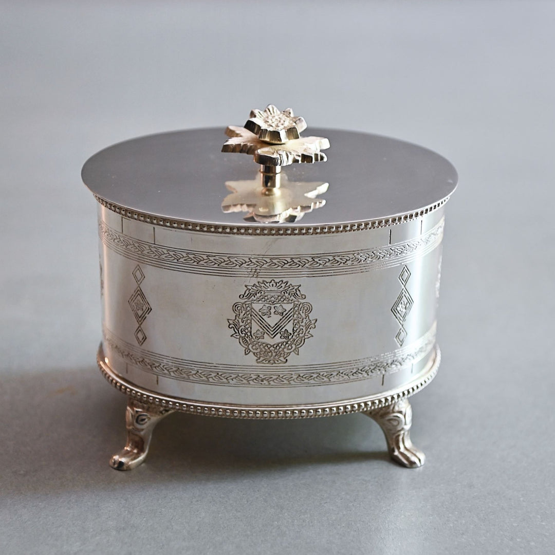 round silver box with lid